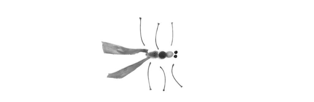 Deconstructed natural elements including twigs, bulbs, legumes, and leaves used to craft a bee figure